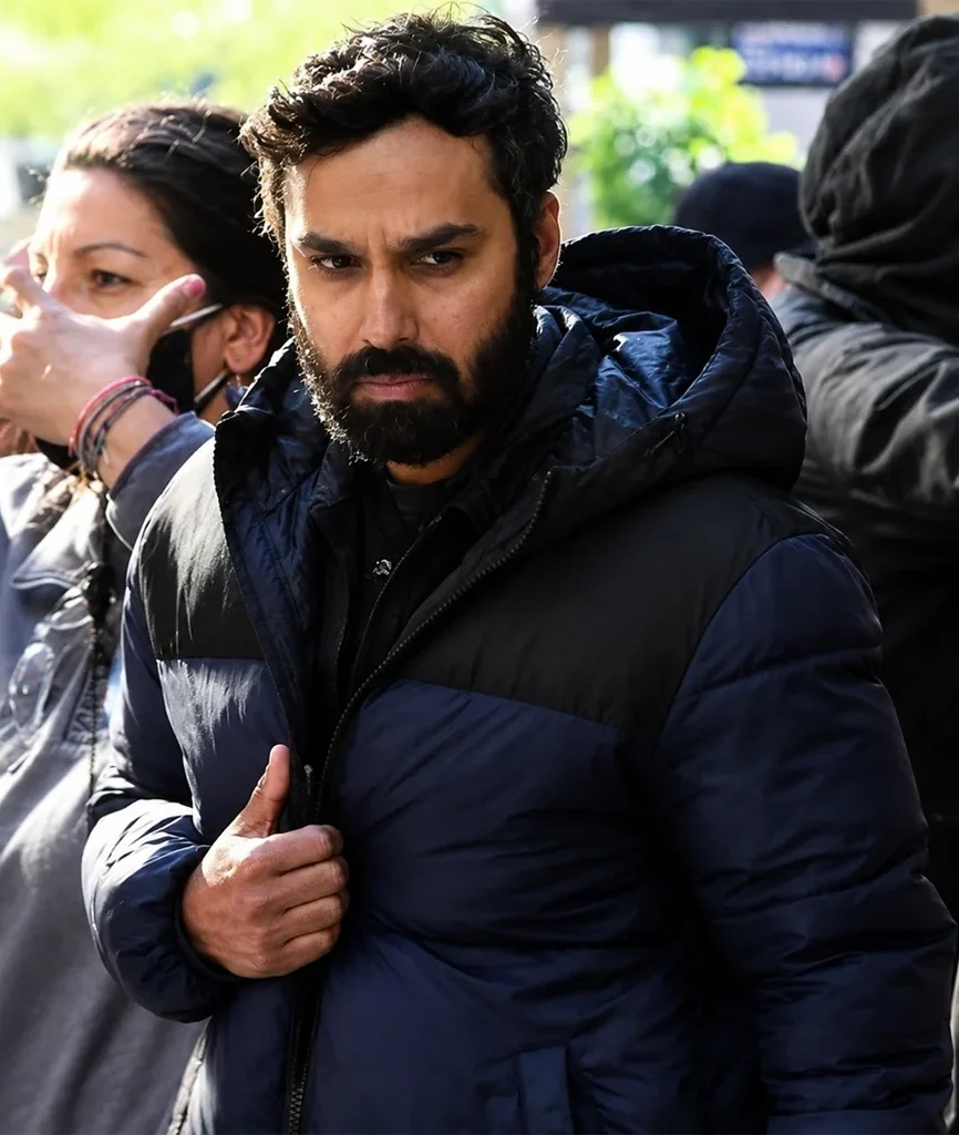 Aadesh Chopra Suspicion 2022 Kunal Nayyar Blue Puffer Jacket
